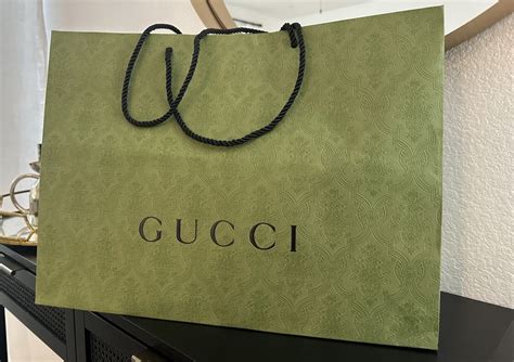 gucci black cat green|white gucci shopping bag.